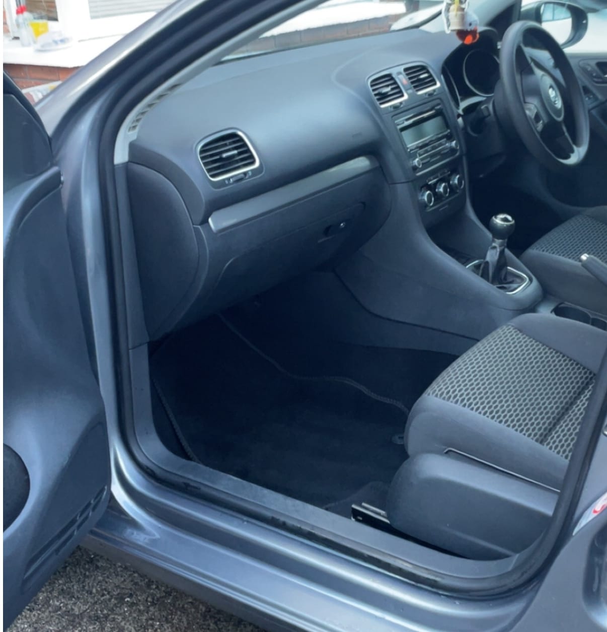 a car interior and dashboard after detailing