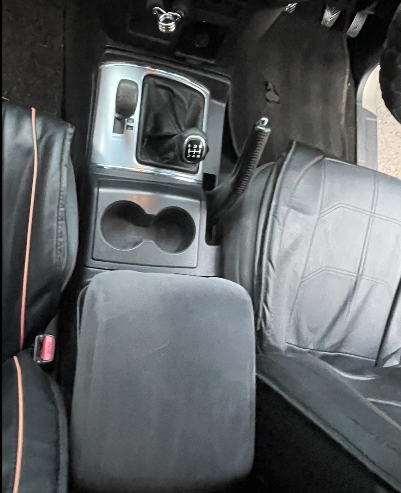 an SUV centre console after detailing