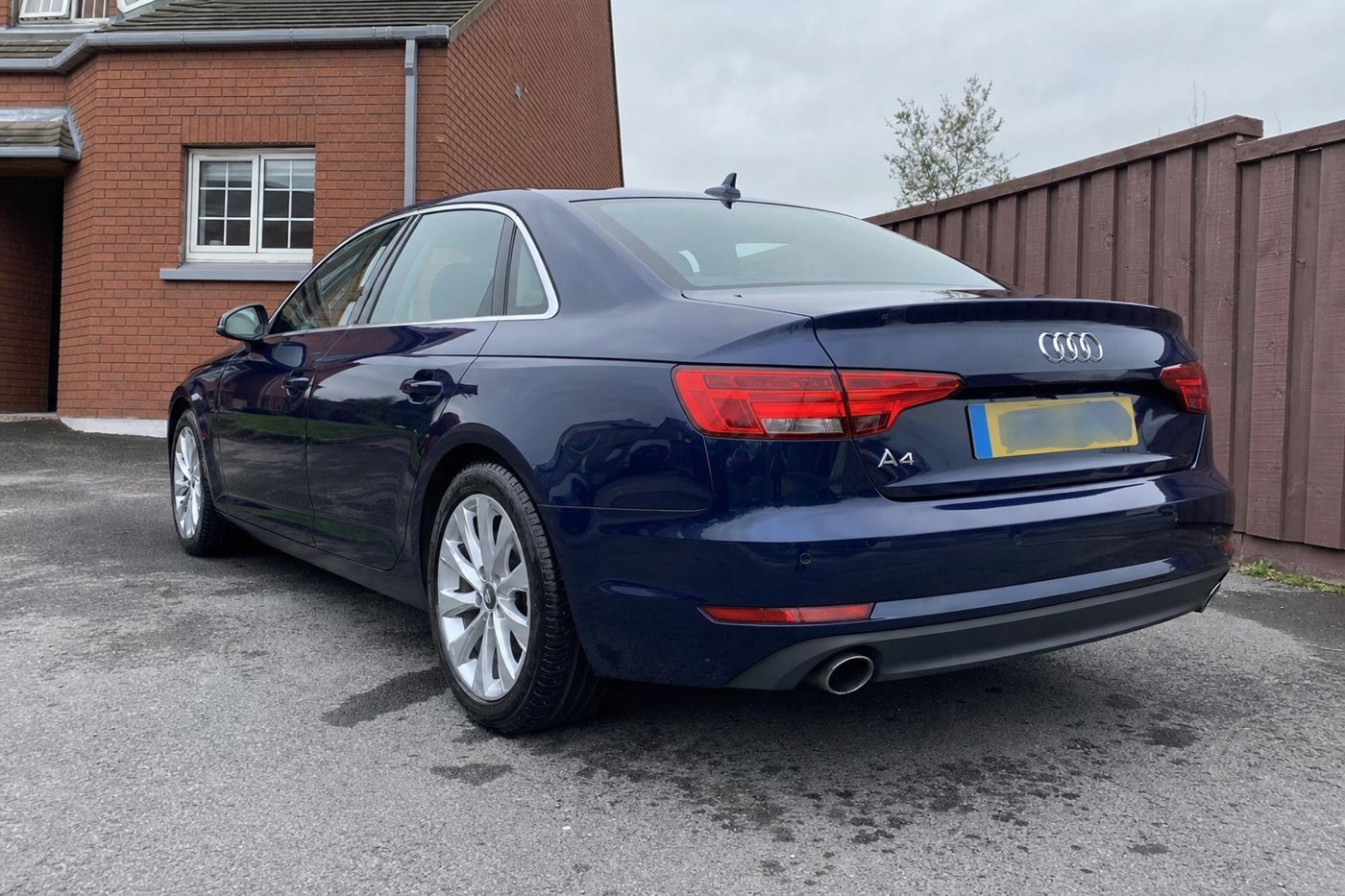 a detailed dark blue saloon after detailing